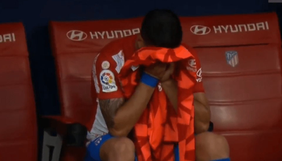 Luis Suarez hid his face when he began to cry after being subbed off