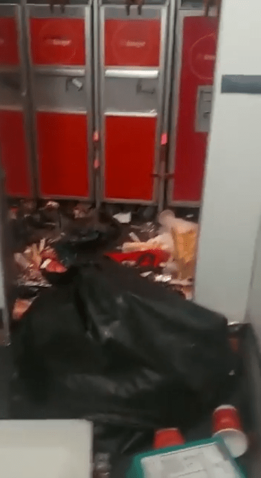 Footage showed rubbish bins strewn across the cabin floor