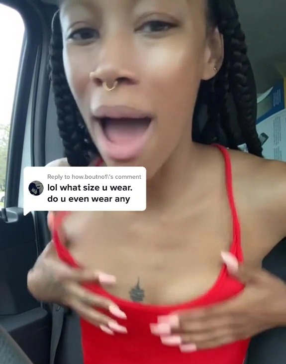 Dominique Symone has hit back at people slating her small boobs