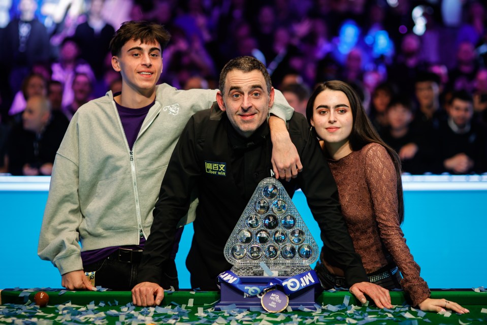 Ronnie celebrated at the 2014 Masters with his youngest daughter and son