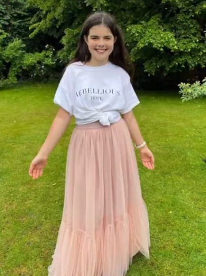 Eloise inspired the skirt and is pictured above wearing it along with the rebellious hope T-shirt