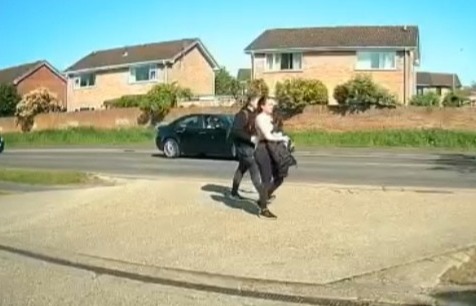 A driver let two women cross the road while trying to turn right