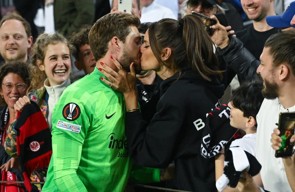 Kevin Trapp and Izabel Goulart share a kiss as the Frankfurt goalkeeper knocks Barcelona out of the Europa League