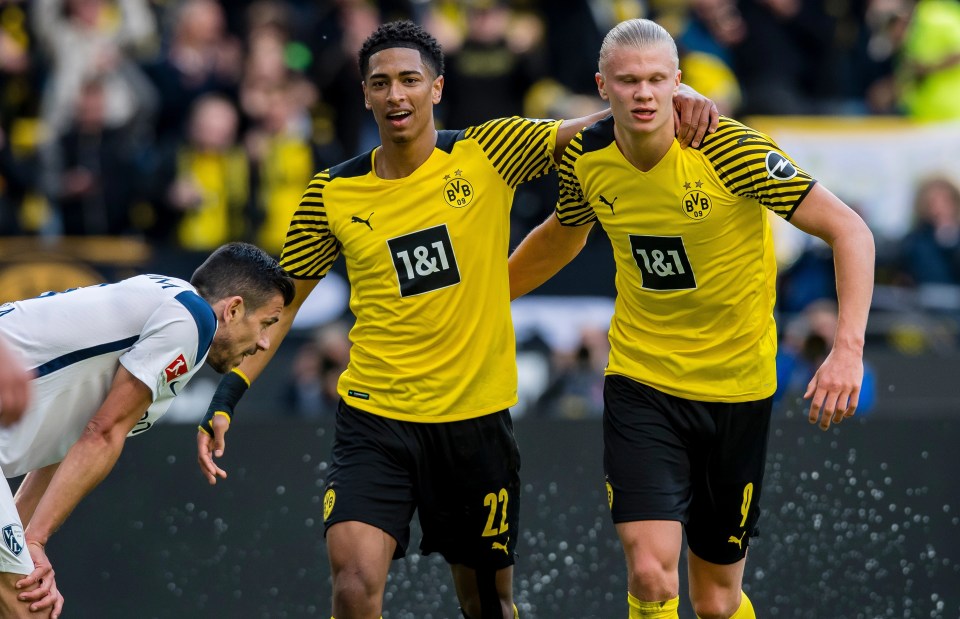 Jude Bellingham celebrates with Man City bound Erling Haaland