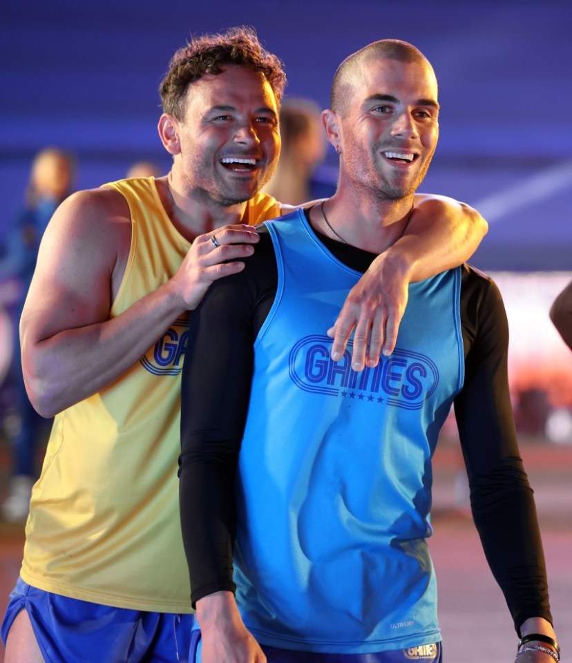 She'll be there to support Tom's bandmate Max, pictured with The Games co-star Ryan Thomas, left