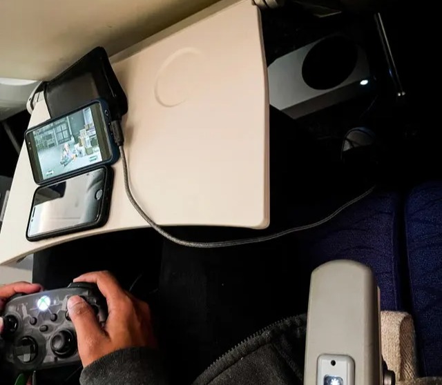 A passenger was branded a “legend” for bringing an Xbox with him on a long-haul flight