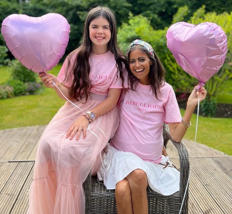 The 40-year-old launched a range of colours, she is pictured above wearing the pink version with her daughter Eloise