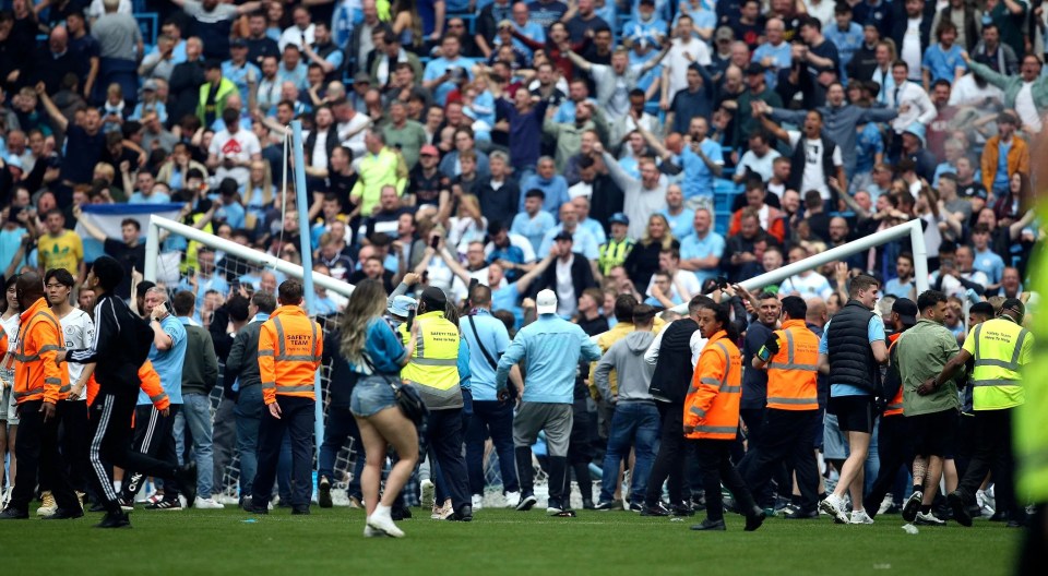 Man City fans invaded the pitch after they won the league and Aston Villa player Robin Olsen was hurt by a fan