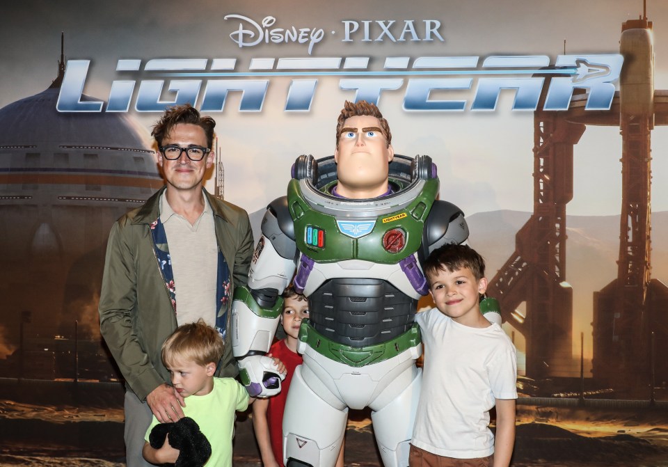 Tom took his son Buzz to meet his namesake Buzz Lightyear at the premiere with his brothers