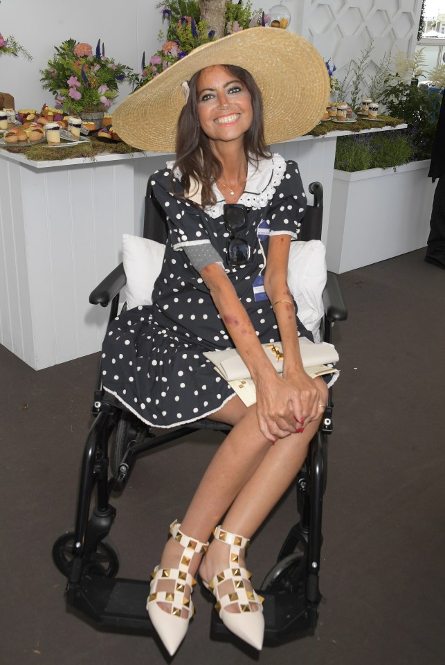 Dame Deborah James beamed at the camera this afternoon as she enjoyed a day at Royal Ascot