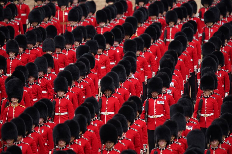 Female soldiers in the Queen's elite bodyguard have demanded the Army stop calling them 'men'