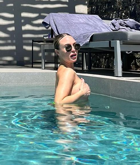 The Hollyoaks star captioned thepics: 'Perks of a private pool'