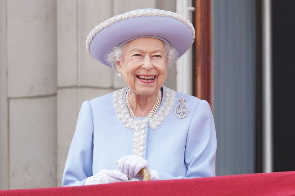 The Queen watches from the balcony during Trooping the Colour at Horse Guards Parade