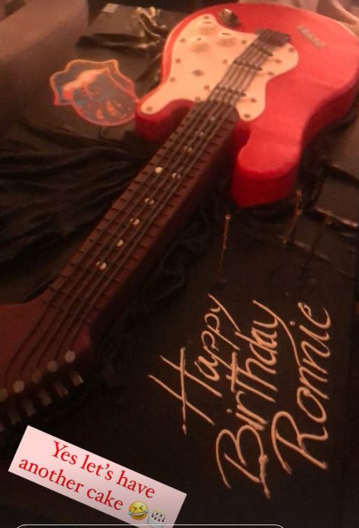 Ronnie got a guitar-shaped cake as he celebrated with bandmates Mick Jagger and Keith Richards