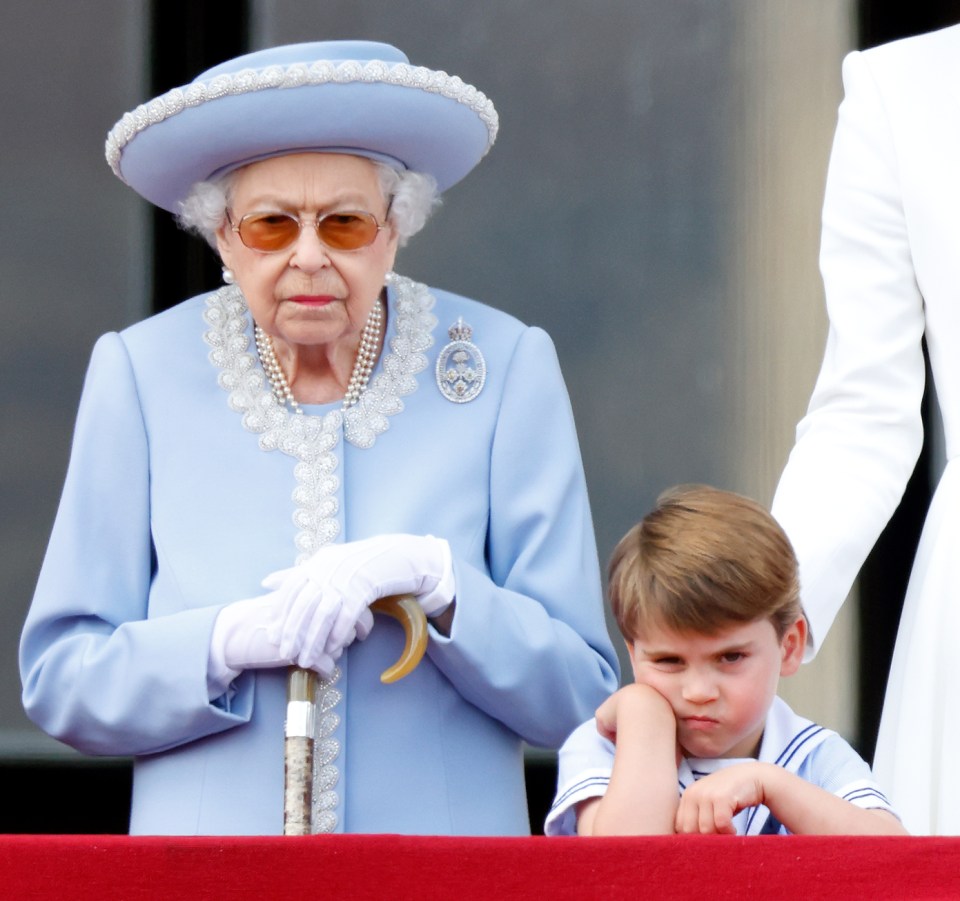 One is not amused - Louis pulls a face as he waits for the Red Arrows