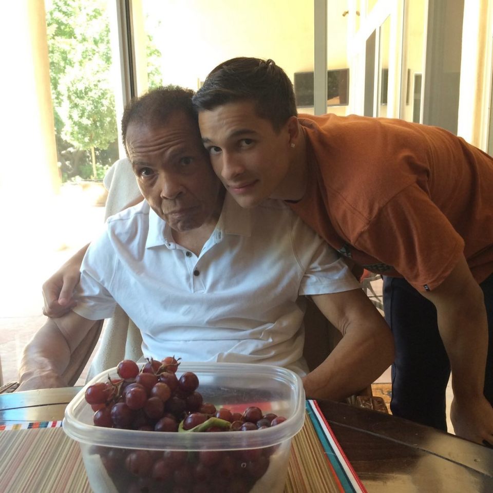 Ali Walsh with his grandfather, the legendary Muhammad Ali