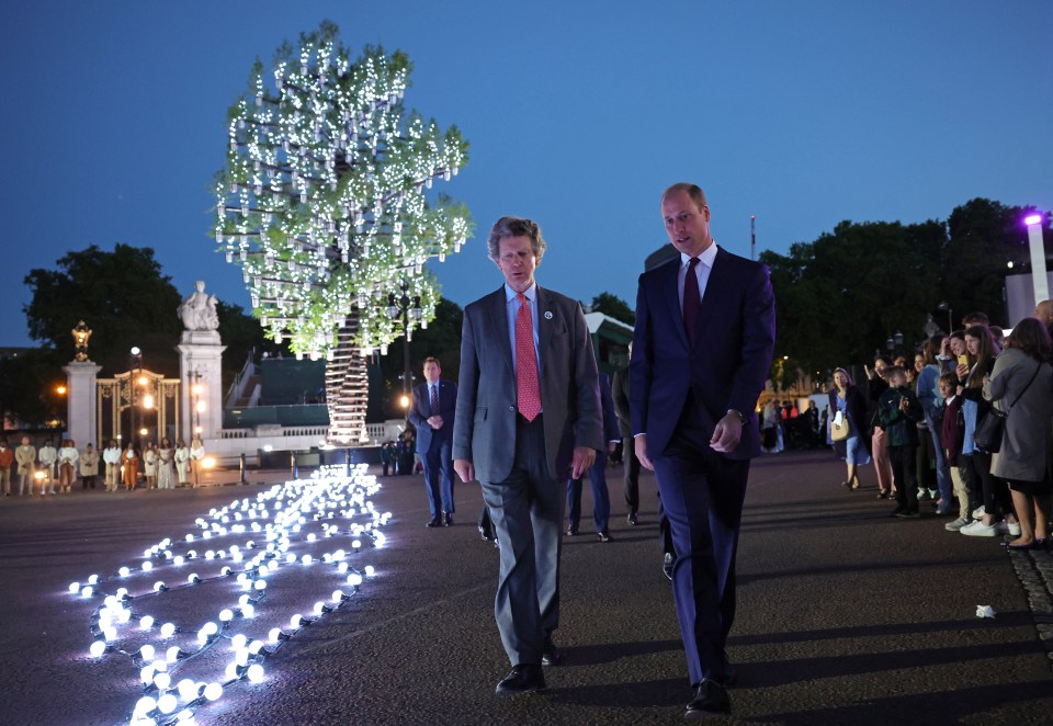 He was joined by Sir Nicholas Bacon as he lit the 70ft Tree of Trees beacon