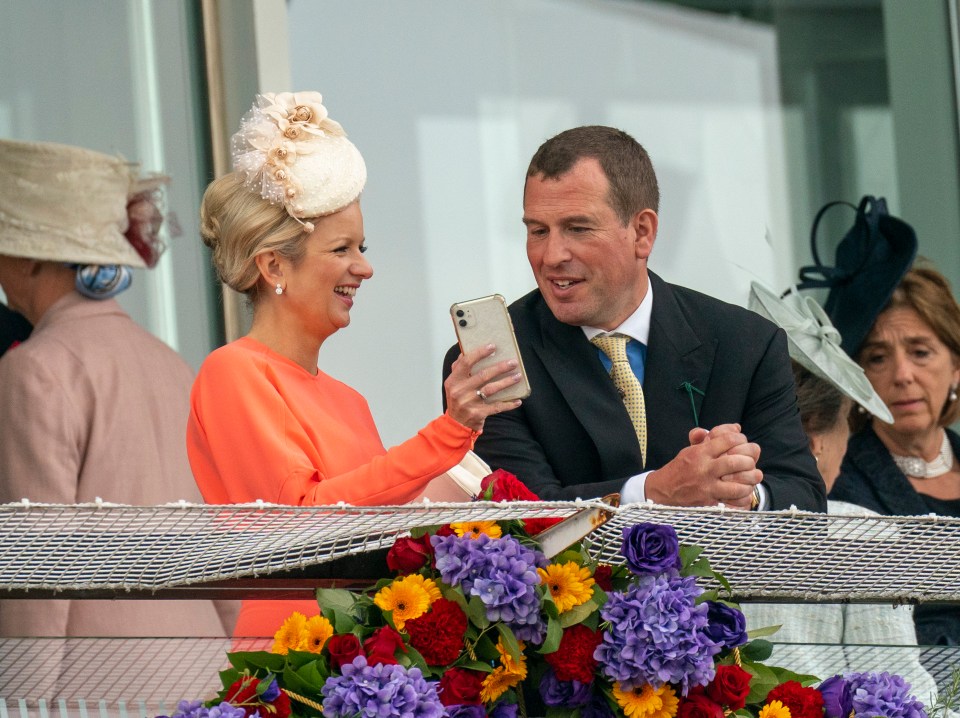 Peter Phillips and his girlfriend Lindsay Wallace in the royal box