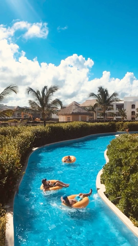 The hotel has a lazy river connecting all the pools