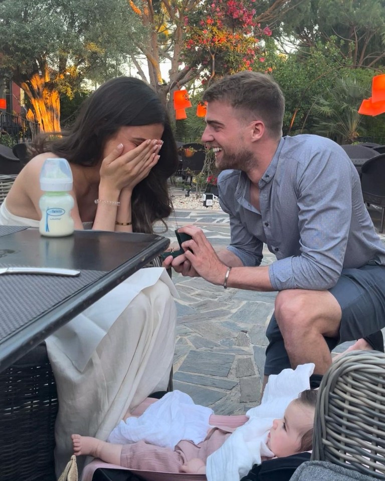 Partner Michaela joyfully accepts Patrick's proposal