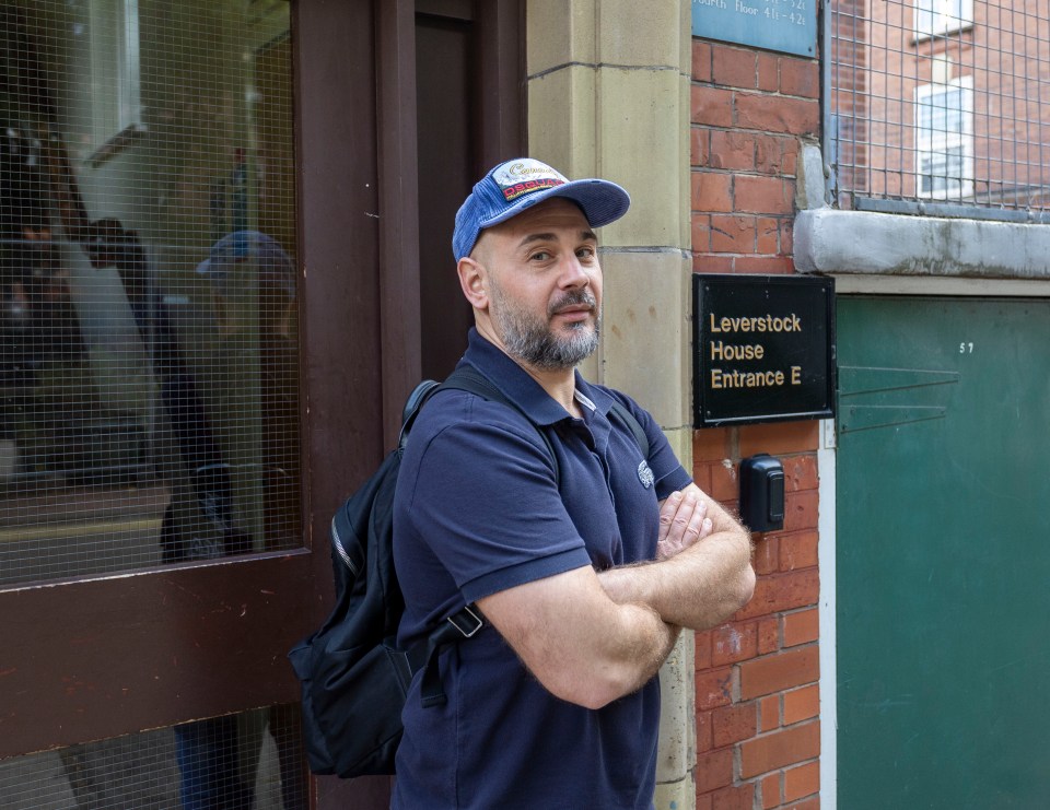 Fillipe Scalora outside his Chelsea flat which has been taken over by a squatter