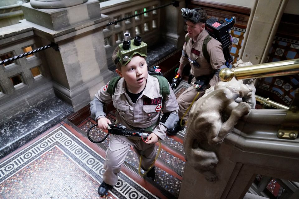 George Hinkins, 8, was yesterday driven in the Ghostbusters' Ecto-1 vehicle to Leeds Central Library, which was transformed into a haunted house