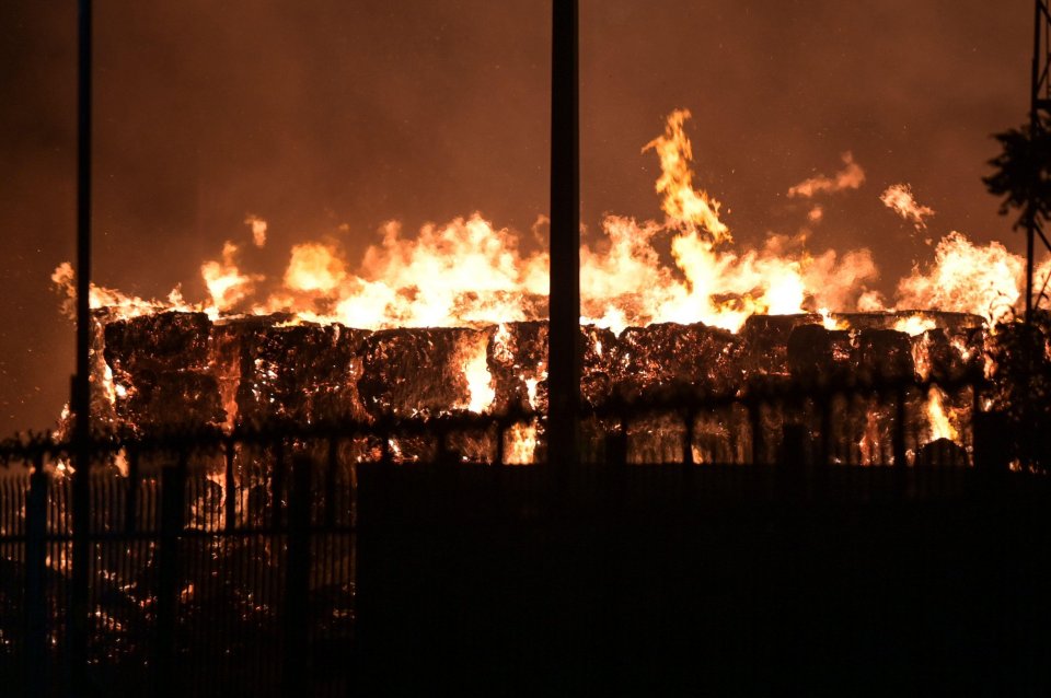 Thousands of tons of paper and cardboard caught fire