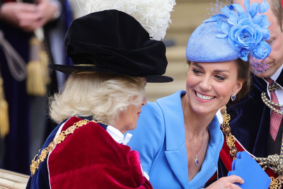 Kate, 40, beams as she chats with her mother-in-law Camilla