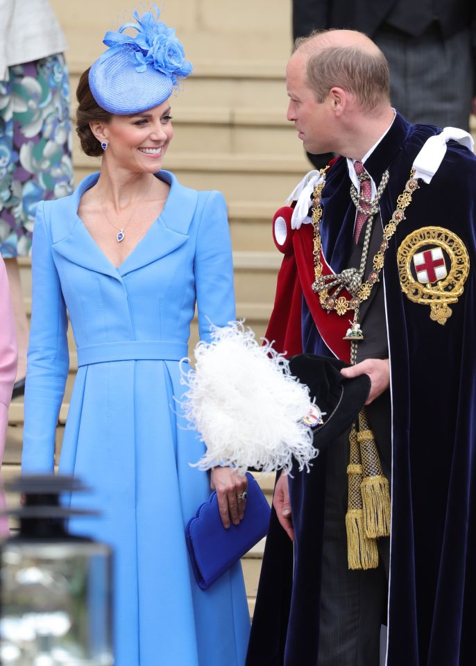 Kate Middleton smiles at her husband Prince William at the service yesterday