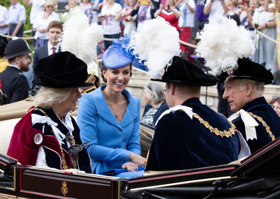 Kate Middleton wearing all blue with Camilla, Duchess of Cornwall, Prince Charles and Prince William