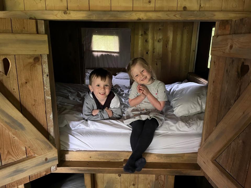 We told Albie, five, and three-year-old Mila we were sleeping in a tent, but it was actually a canvas lodge with ready-made beds and an en suite shower with hot water