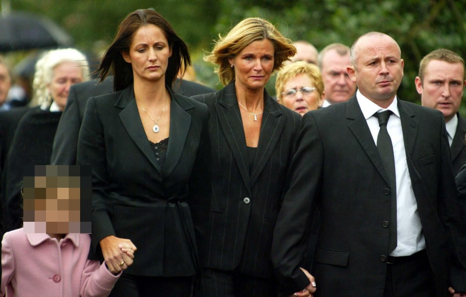 Keith Frogson's two daughters and son at his funeral