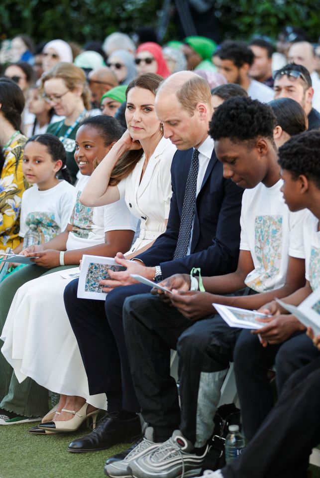 The couple visited the block in north Kensington and sat with survivors and those who lost loved ones in the horror