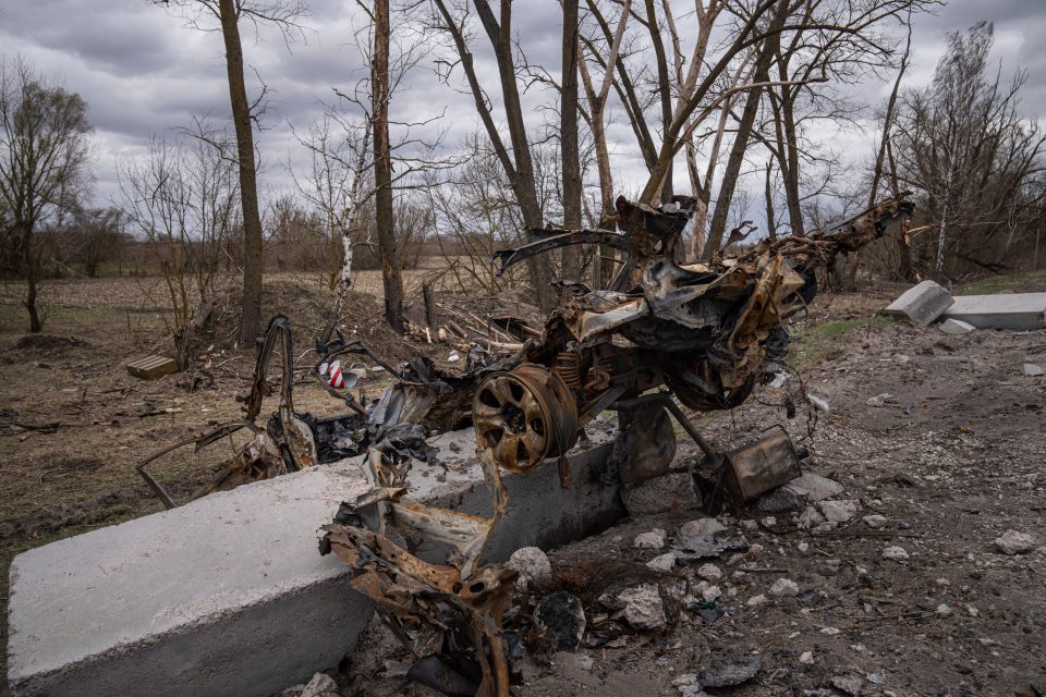 The wreckage of the family's car after Russian shelling