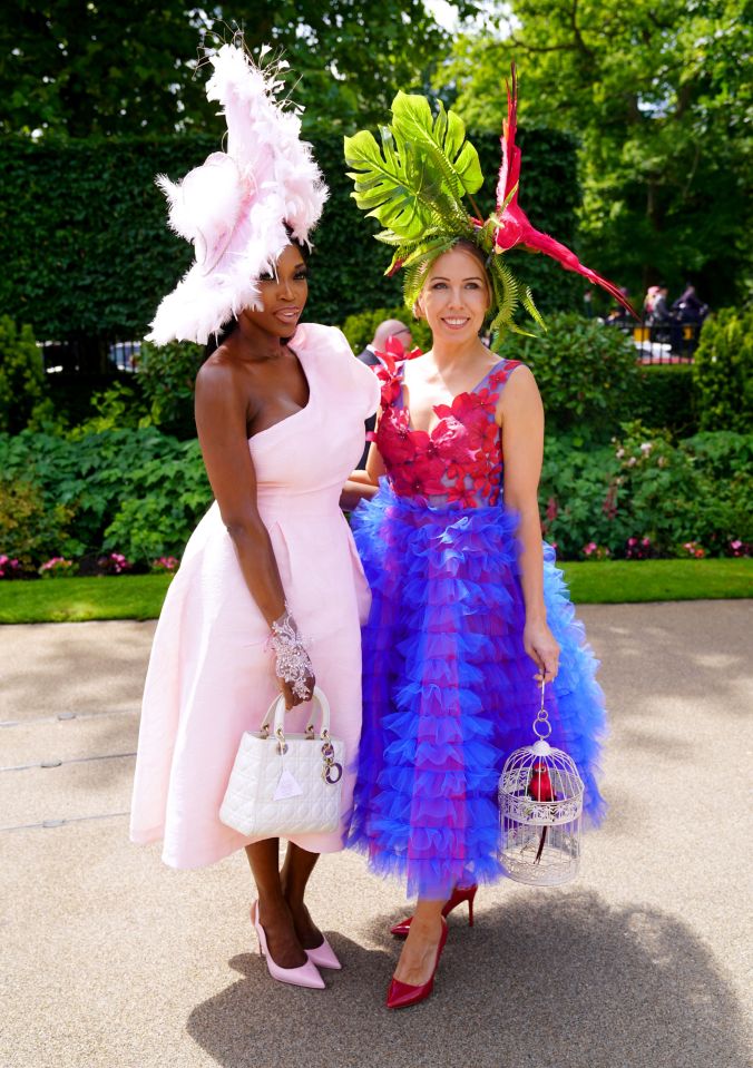 Two colourfully-dressed friends pose for photos at the Berkshire racecourse