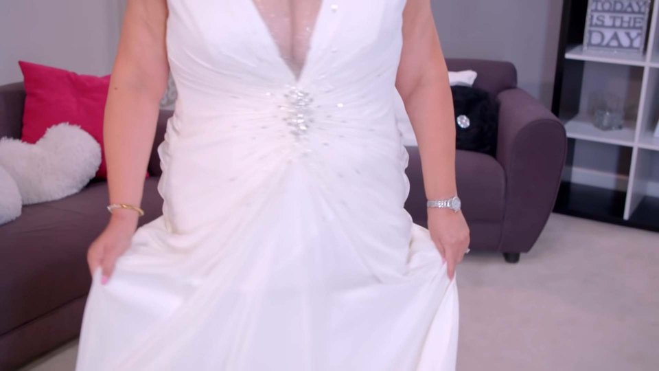 The glamorous gown showed the perfect amount of boob for the bride