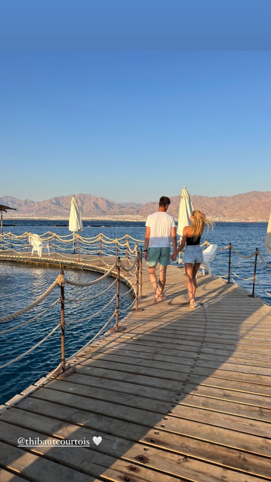 The pair strolled along the picturesque coastline as they soaked in the sun