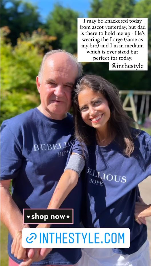 The Dame posed in a limited edition Rebellious Hope t-shirt alongside her father