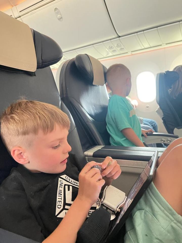 Billy's mum Amanda Brown claims her son sat quietly on his iPad for the whole flight