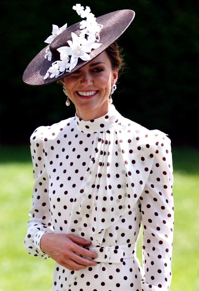 Kate teamed her Alessandra Rich polka dot dress as temperatures soared, completing her look with a bespoke Sally-Ann Provan hat