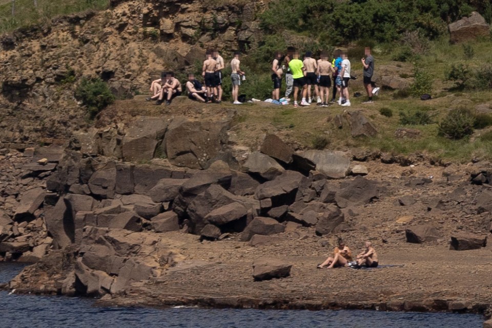 A group of teens were told off for tombstoning at Dove Stone reservoir in Oldham