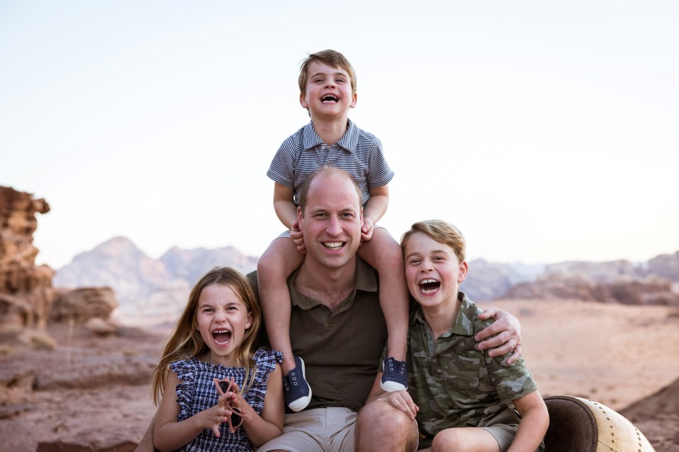 This adorable family photo from the Cambridge's trip to Jordan last year was released for Father's Day and was taken by Kate