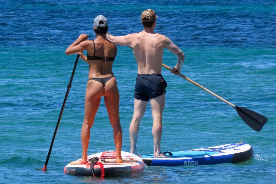 The couple joked about being stuck out in the water on their paddle boards