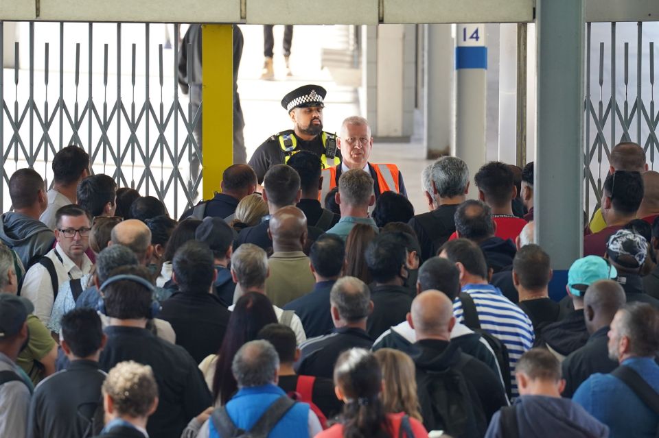 Cops were at Stratford station today as Brits waited for it to open