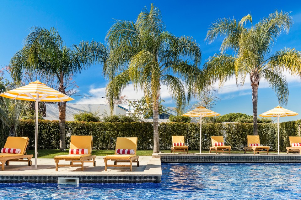 Lounge around and soak up the sun by the Miami style pool