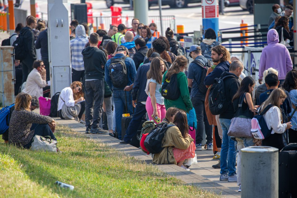 Long queues for the bus outside Stansted airport