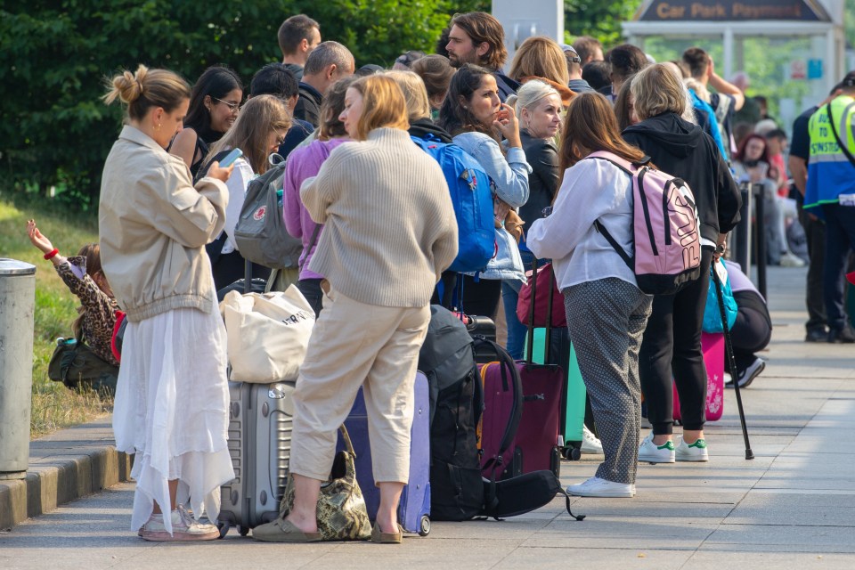 People queuing to leave Stansted airport as travel chaos continues