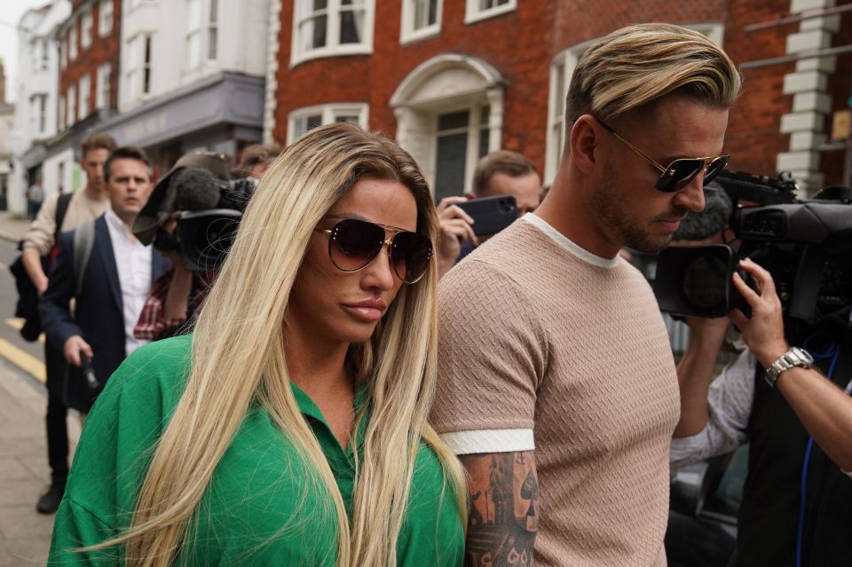 She was joined outside court by fiance Carl Woods ahead of their holiday today