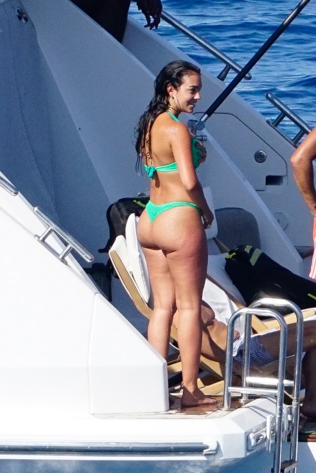 Georgina stunned in a green bikini