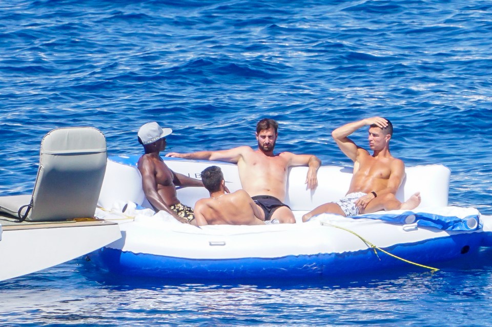 Ronaldo chilling on an inflatable with pals